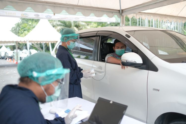 Vaksinasi Secara Drive Thru, Begini Ini Lho Alur Pelayanannya